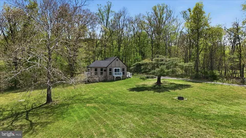 a house view with a garden space