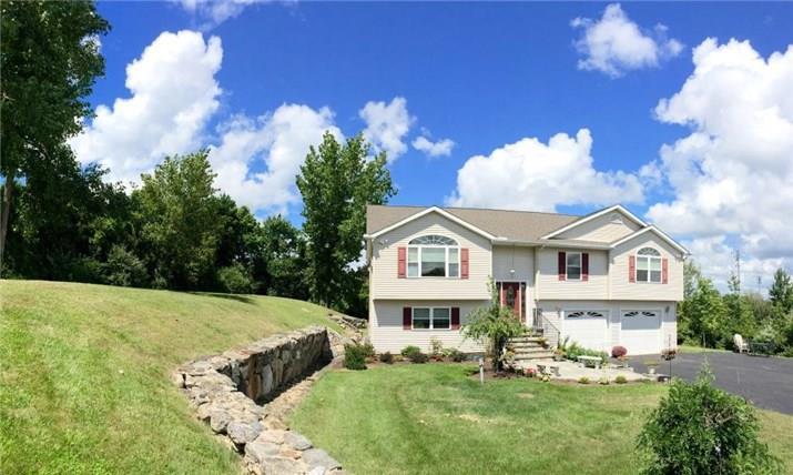 58 Gillotti Road New Fairfield, CT 06812 - Photo 1 of 1 a front view of a house with garden