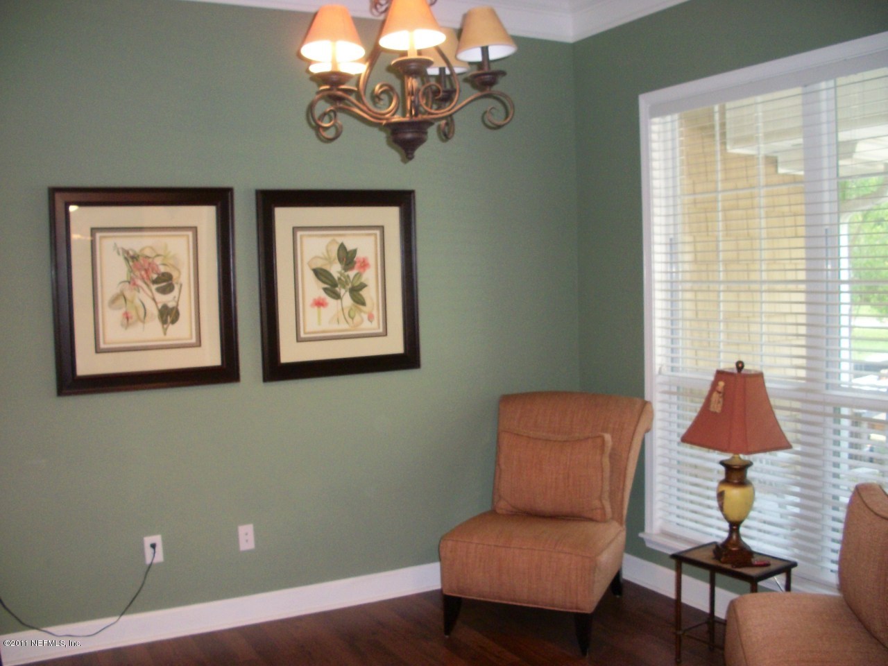 97274 Pirates Point Road Yulee, FL 32097 - Photo 8 of 20 a view of a workspace with furniture and a window