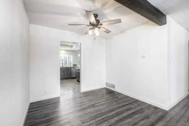 a view of a livingroom with wooden floor