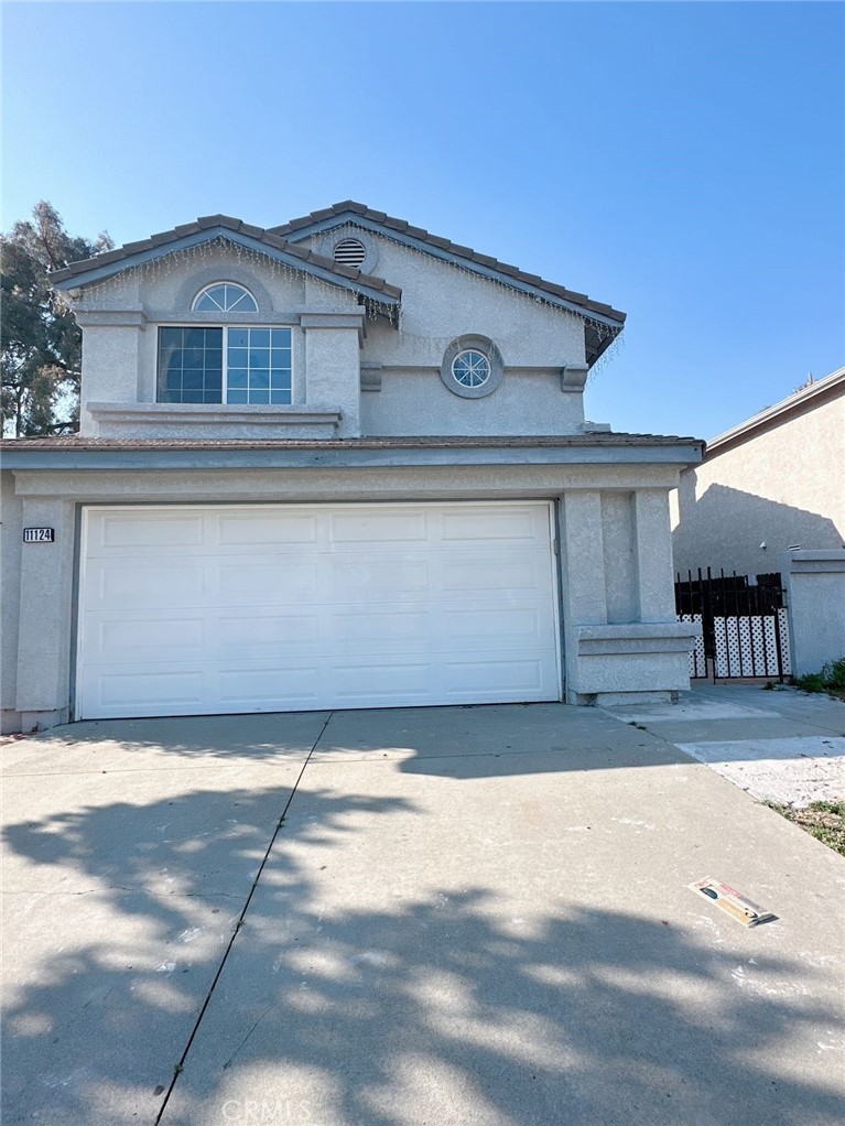 11124 Charleston Street Rancho Cucamonga, CA 91701 - Photo 1 of 1 a view of a house with a outdoor space