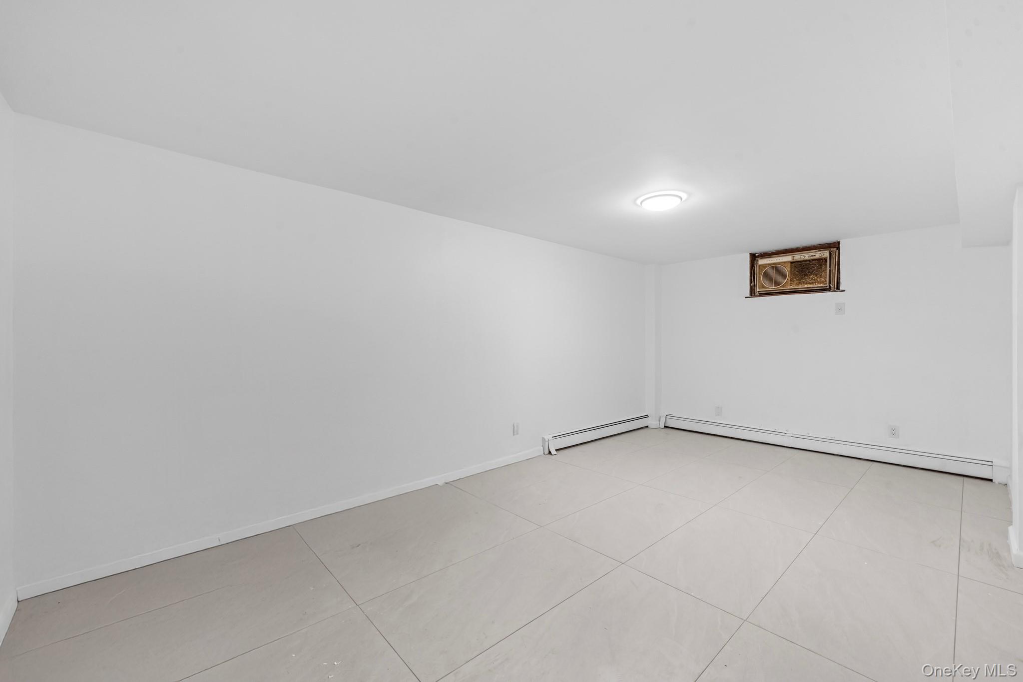 172-11 Horace Harding Expressway Queens, NY 11365 - Photo 15 of 17 a view of an empty room