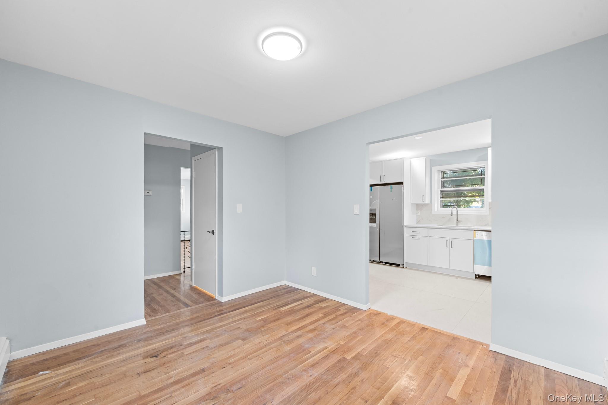 172-11 Horace Harding Expressway Queens, NY 11365 - Photo 8 of 17 a bedroom with a bed and closet