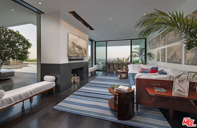 a bathroom with a double vanity sink mirror and shower