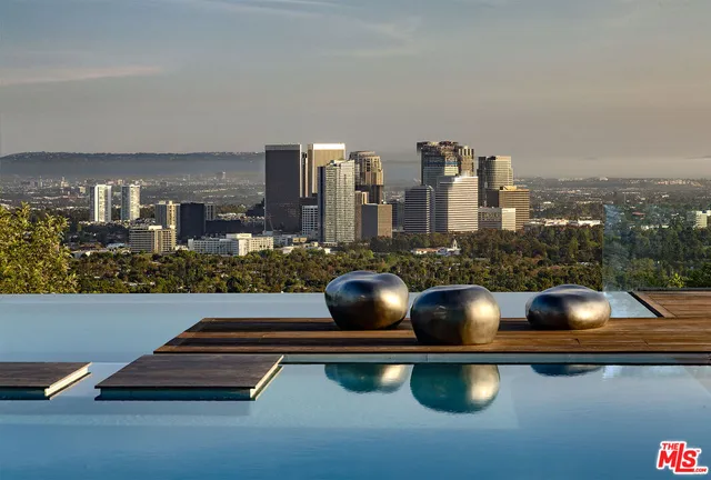 a kitchen with a sink cabinets and window