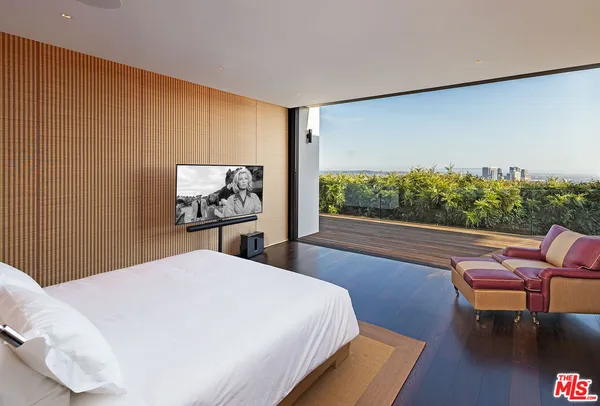 a front view of a house with lots of lights