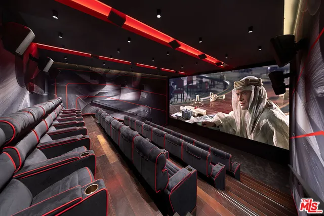 a view of a backyard with palm trees