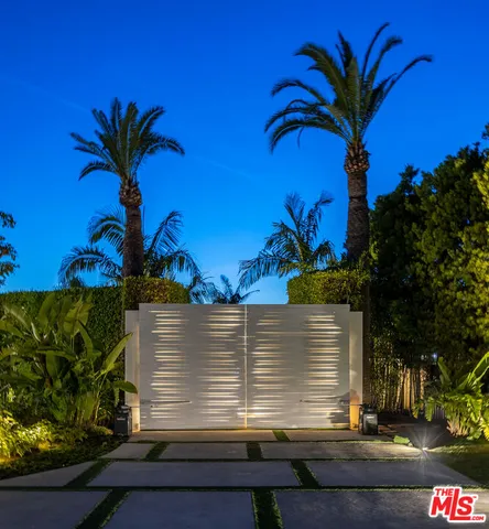 a view of a dining hall with furniture and wooden floor