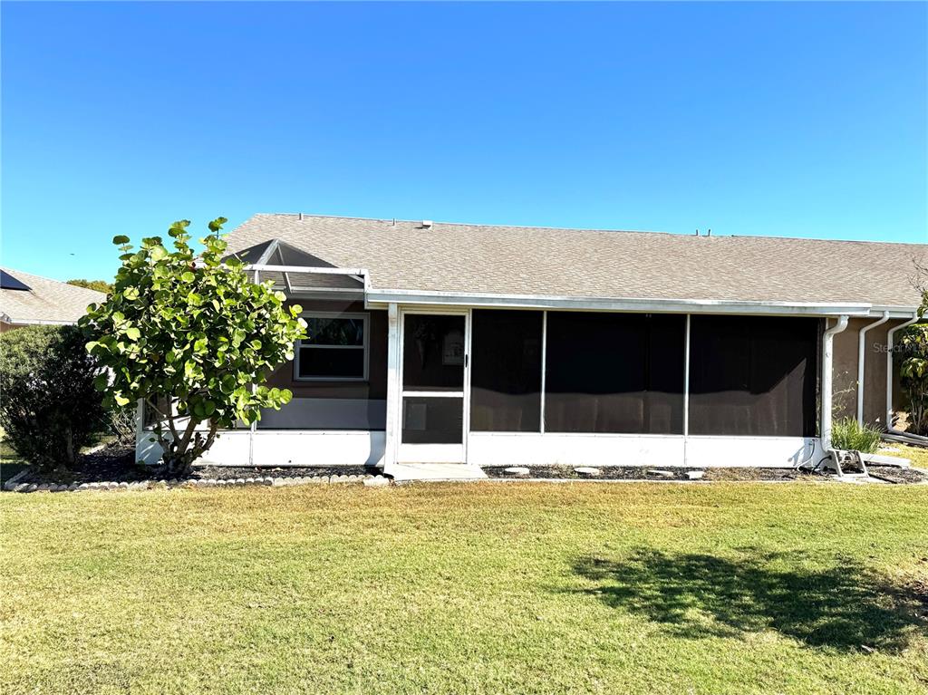 1008 Yellowbird Place Sun City Center, FL 33573 - Photo 2 of 2 a house view with a outdoor space