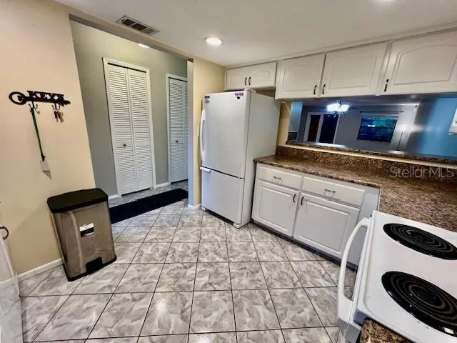 a view of a room with a chandelier