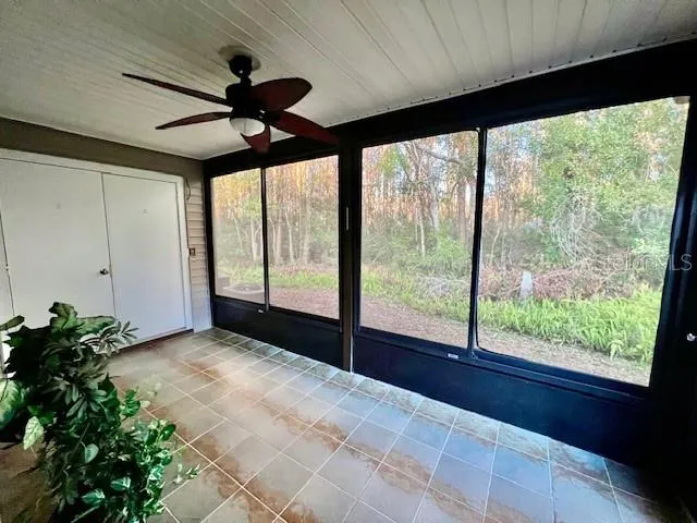 a view of a lake with a yard