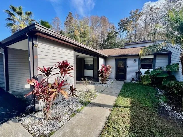 a front view of house with a yard