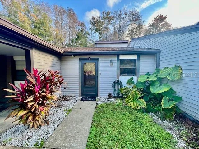 a kitchen with sink and window