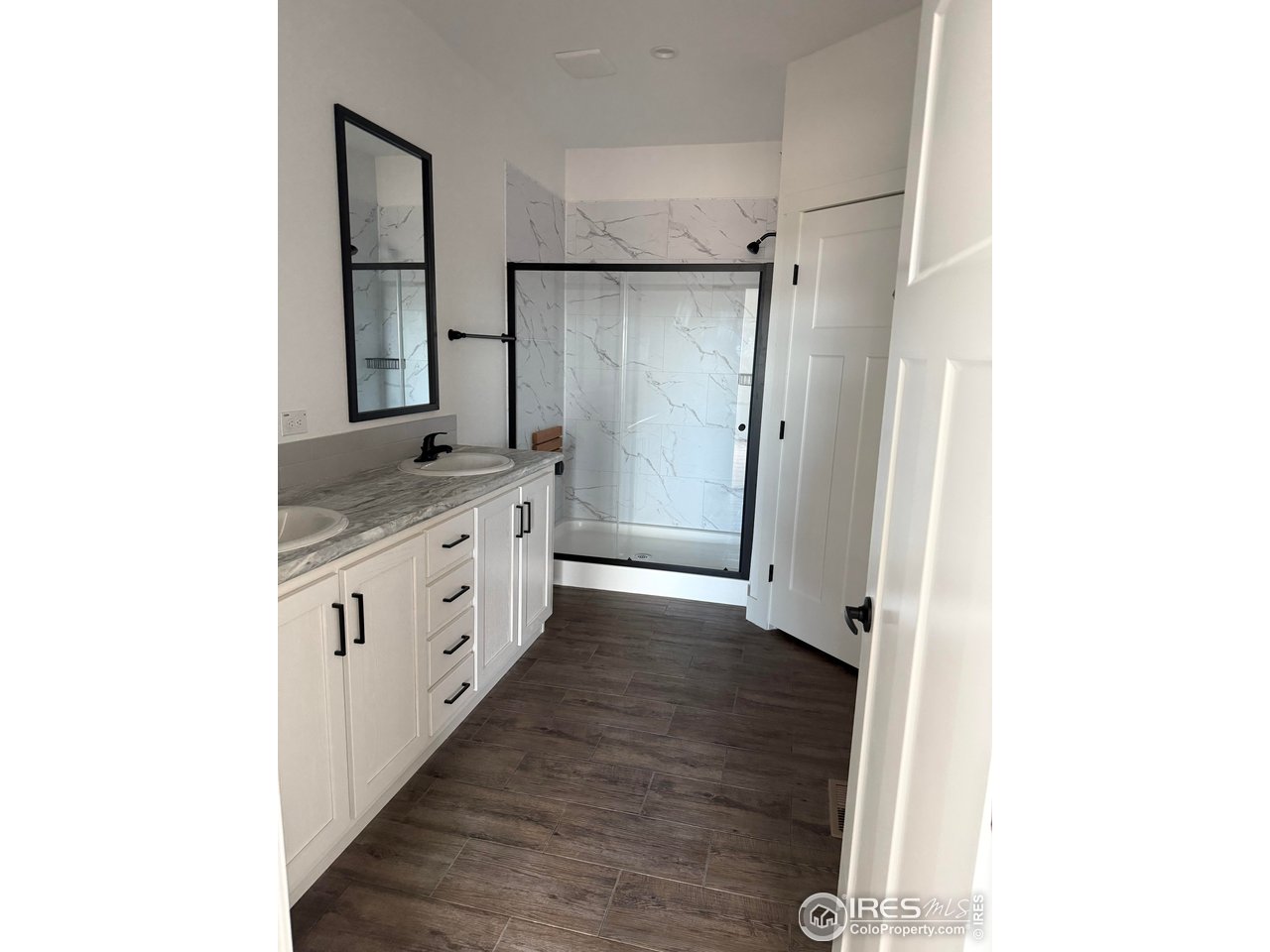 45881 County Road 35 Pierce, CO 80650 - Photo 12 of 47 a large white kitchen with a sink and dishwasher