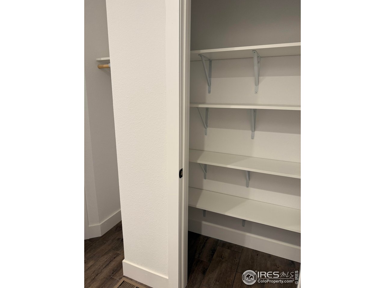 45881 County Road 35 Pierce, CO 80650 - Photo 14 of 47 a view of walk in closet with empty racks