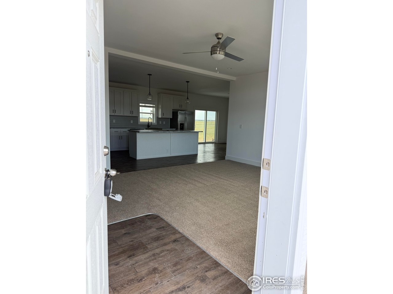 45881 County Road 35 Pierce, CO 80650 - Photo 2 of 47 a view of a hallway view of a room and a livingroom