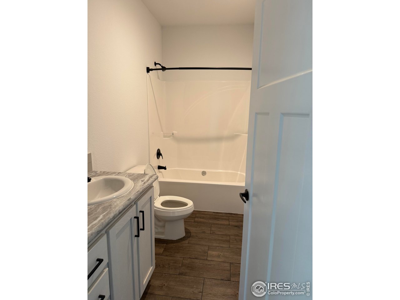 45881 County Road 35 Pierce, CO 80650 - Photo 21 of 47 a bathroom with a sink and a mirror