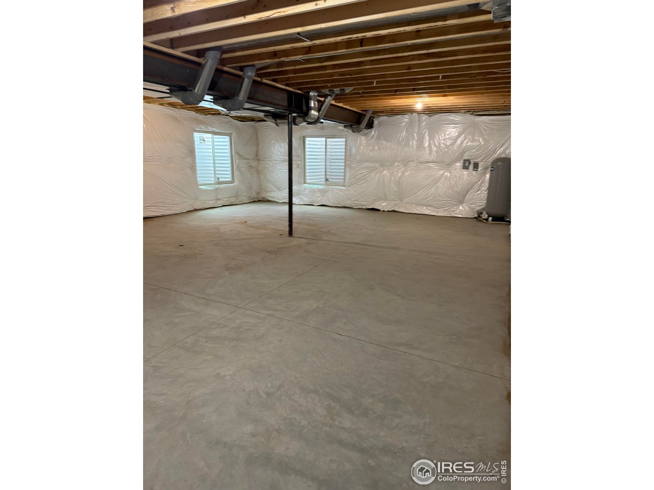 45881 County Road 35 Pierce, CO 80650 - Photo 36 of 47 a view of a room with wooden floor