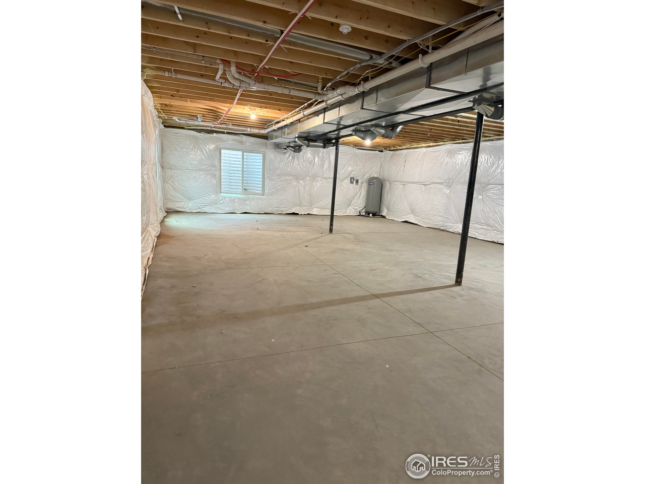 45881 County Road 35 Pierce, CO 80650 - Photo 39 of 47 a view of a room with wooden walls