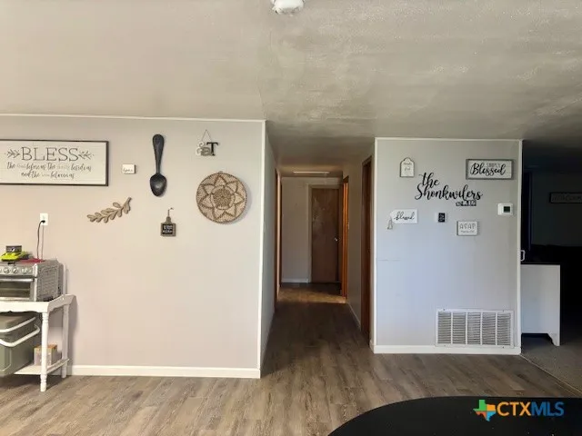 a view of a hallway with elevator