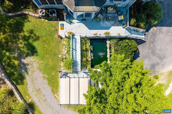 a view of a swimming pool with a patio