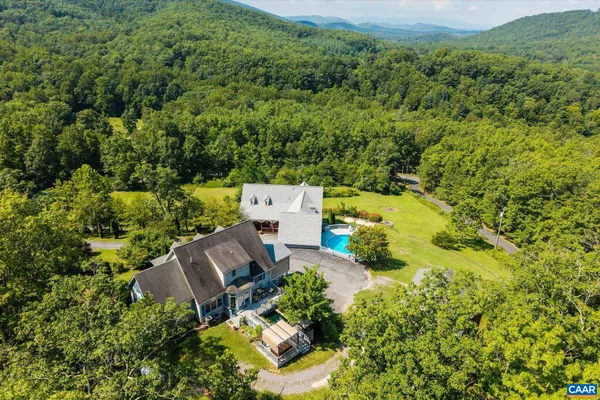 an aerial view of a house with a garden