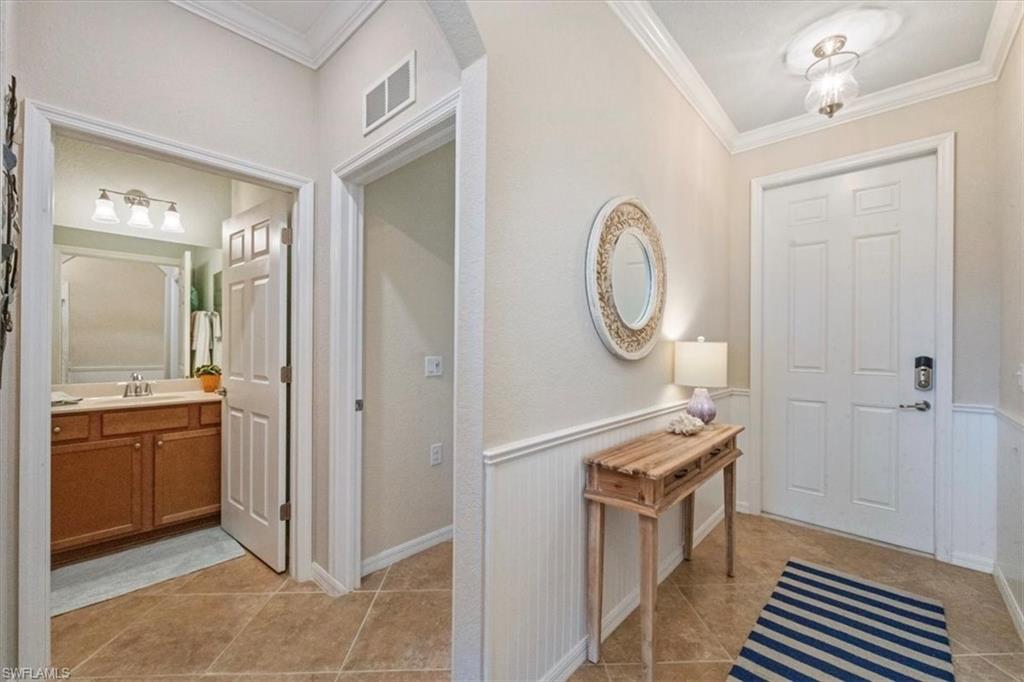 9566 Trevi Court, Unit 4942 Naples, FL 34113 - Photo 20 of 31 a room with storage and utility