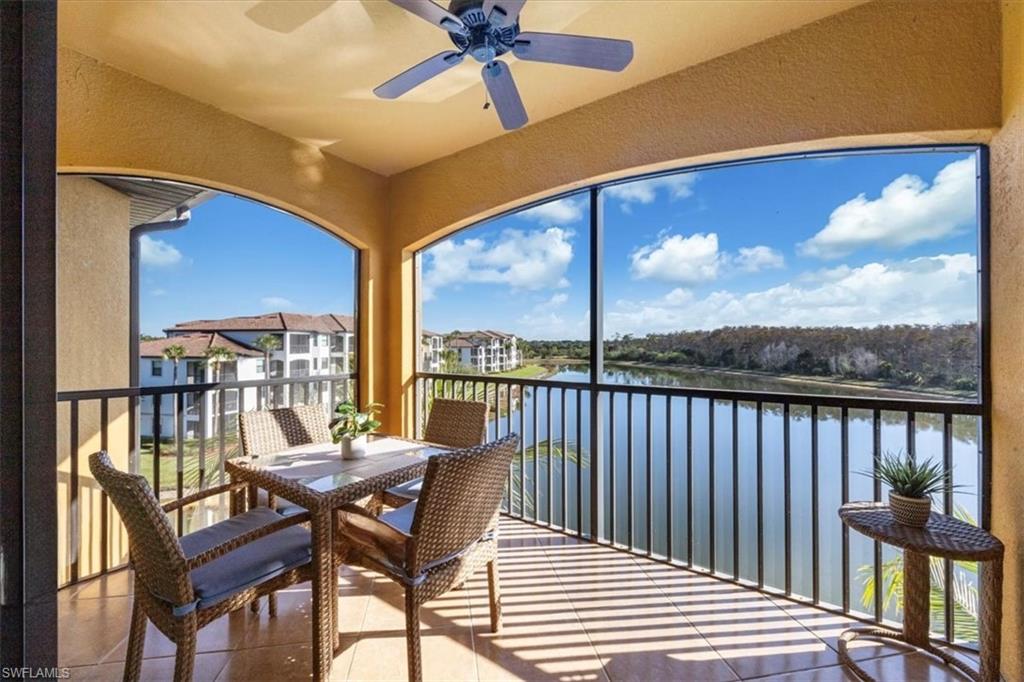 9566 Trevi Court, Unit 4942 Naples, FL 34113 - Photo 4 of 31 a view of a chairs and table in the balcony