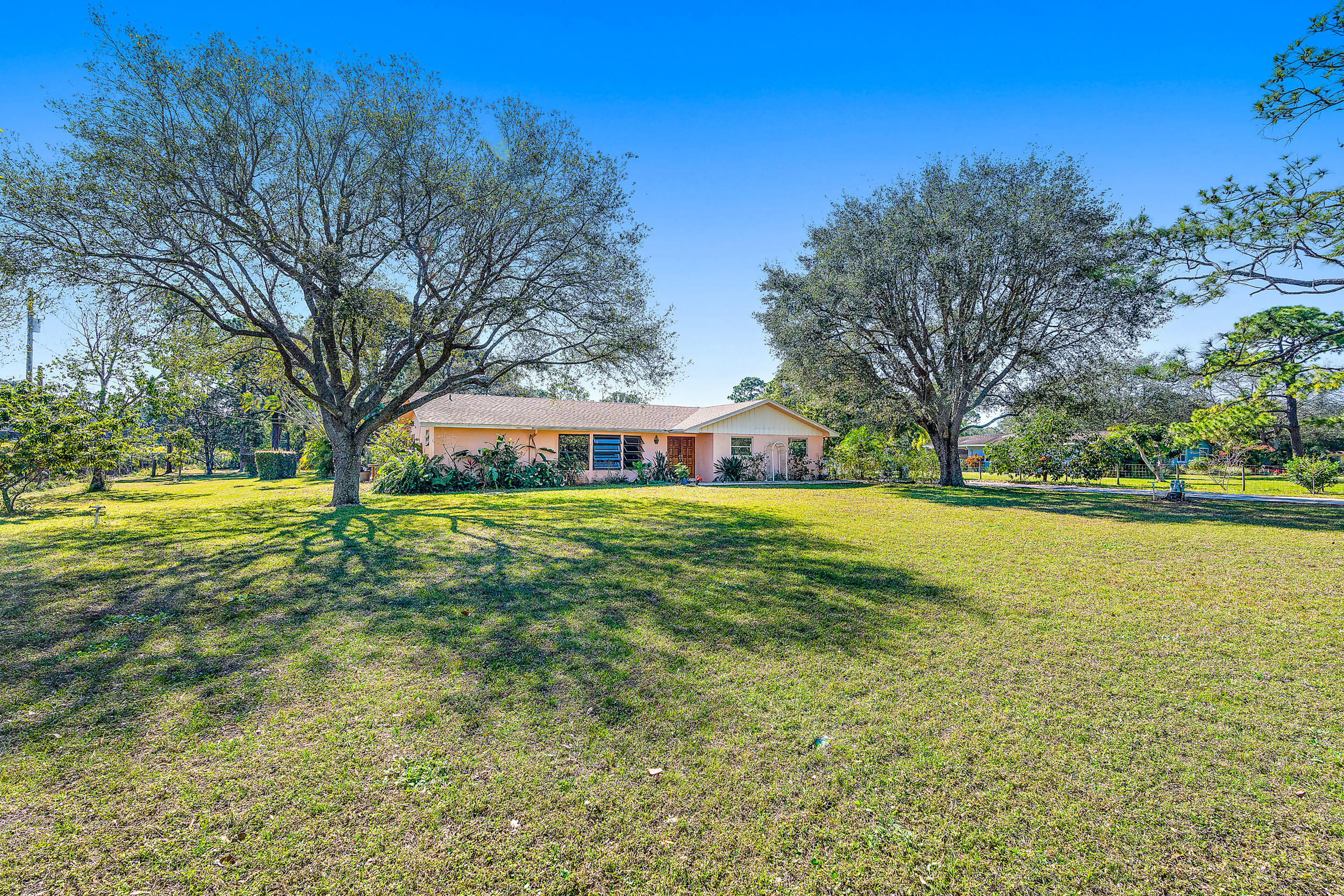6202 Rocking Horse Road Jupiter, FL 33458 - Photo 1 of 19 6202 Rocking Horse Rd-1