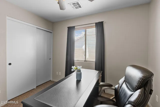 a view of a utility room with closet