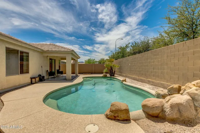 a view of potted plant in front of a building