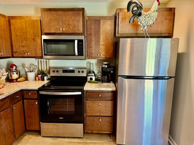 1316 Old Cowan Road Winchester, TN 37398 - Photo 15 of 23 a kitchen with a stove and a microwave