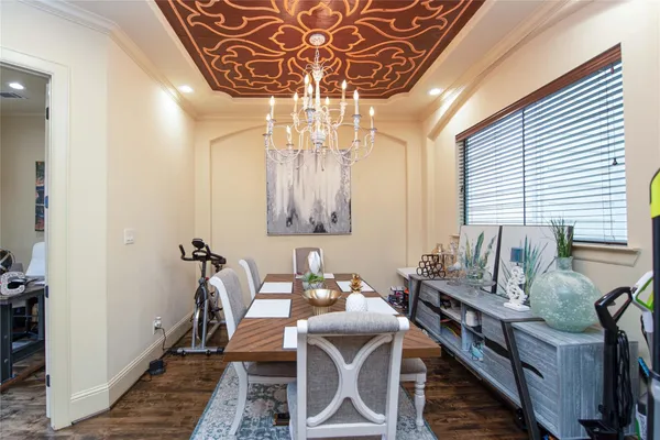 a view of a dining room with furniture