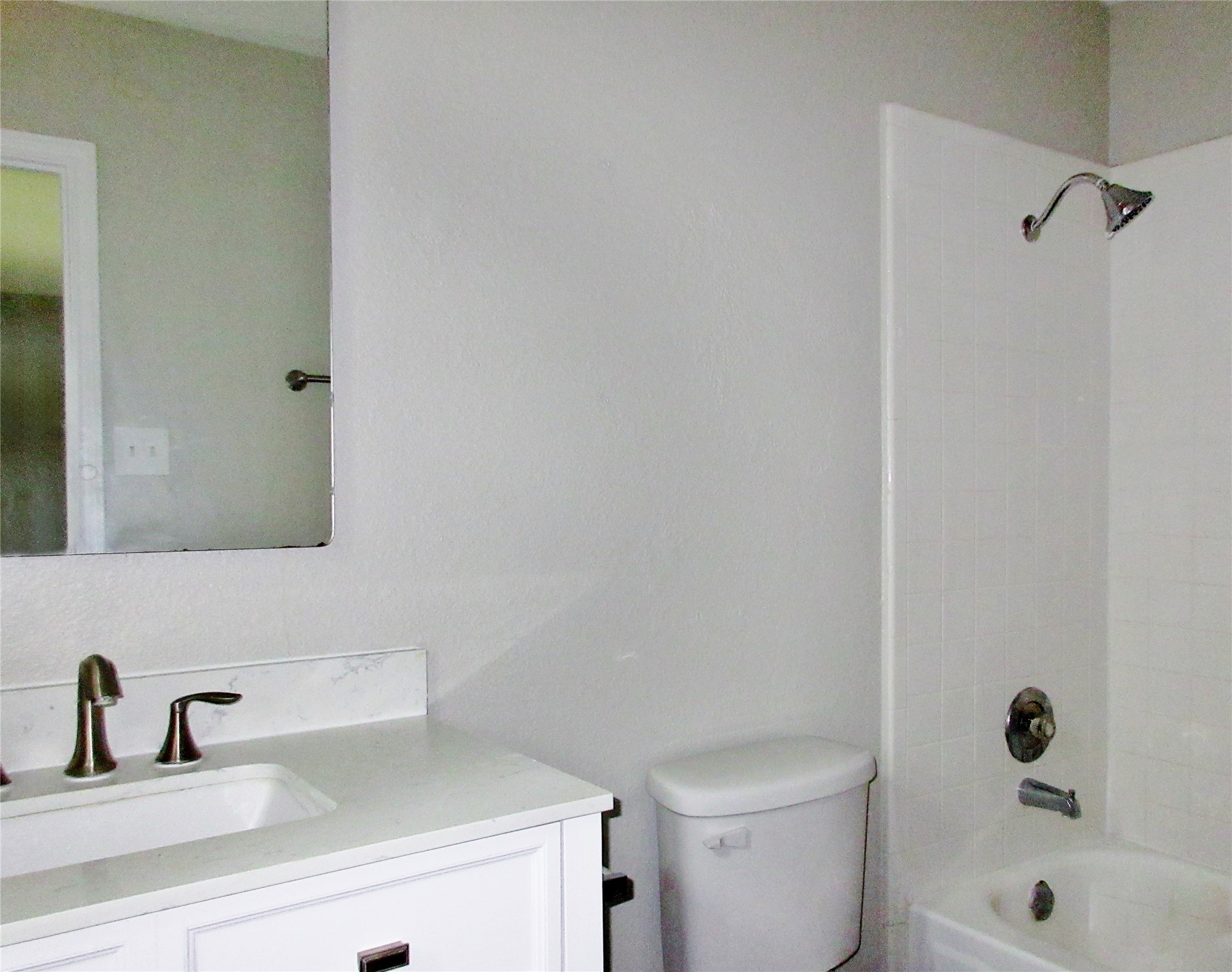 115 Rei Tang Loop Kyle, TX 78640 - Photo 8 of 17 a bathroom with a sink a toilet and shower