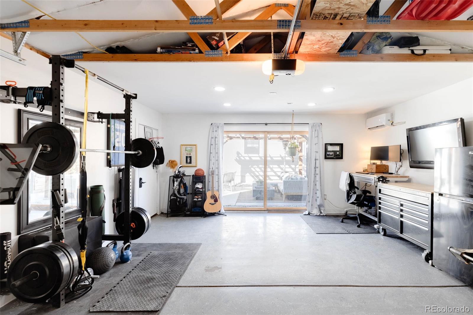 1058 Jackson Street Denver, CO 80206 - Photo 24 of 24 a view of a room with gym equipment