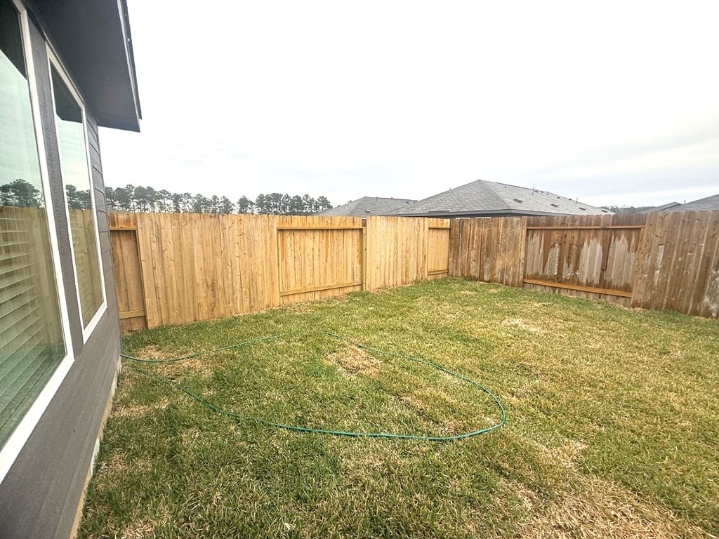 1520 Sunset Ridge Drive Conroe, TX 77306 - Photo 9 of 11 a view of lake with a big yard