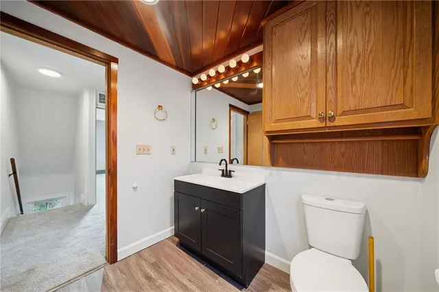 a bathroom with a bathtub and a toilet