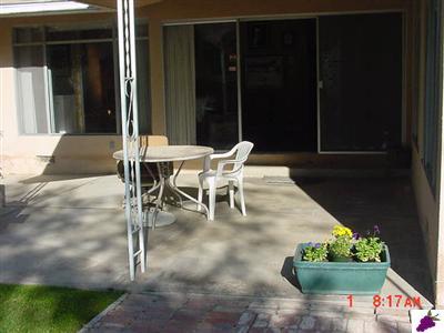 1182 North Reed Avenue Reedley, CA 93654 - Photo 5 of 32 View of patio/glass sliders lead indoors to dining room.