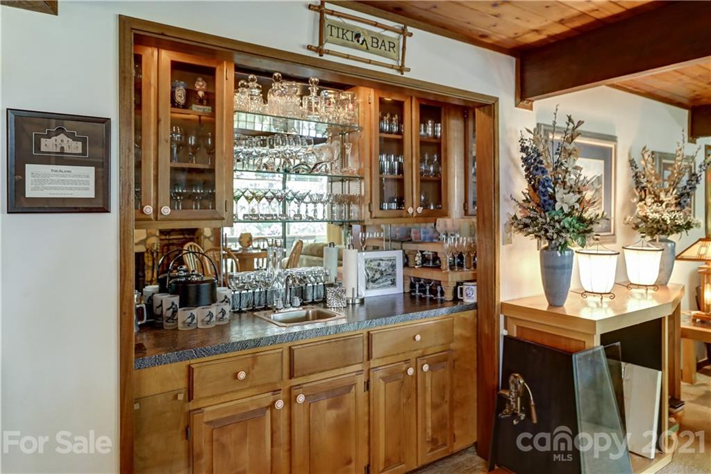 8017 Kiwi Point Tega Cay, SC 29708 - Photo 21 of 43 a kitchen with a sink and cabinets