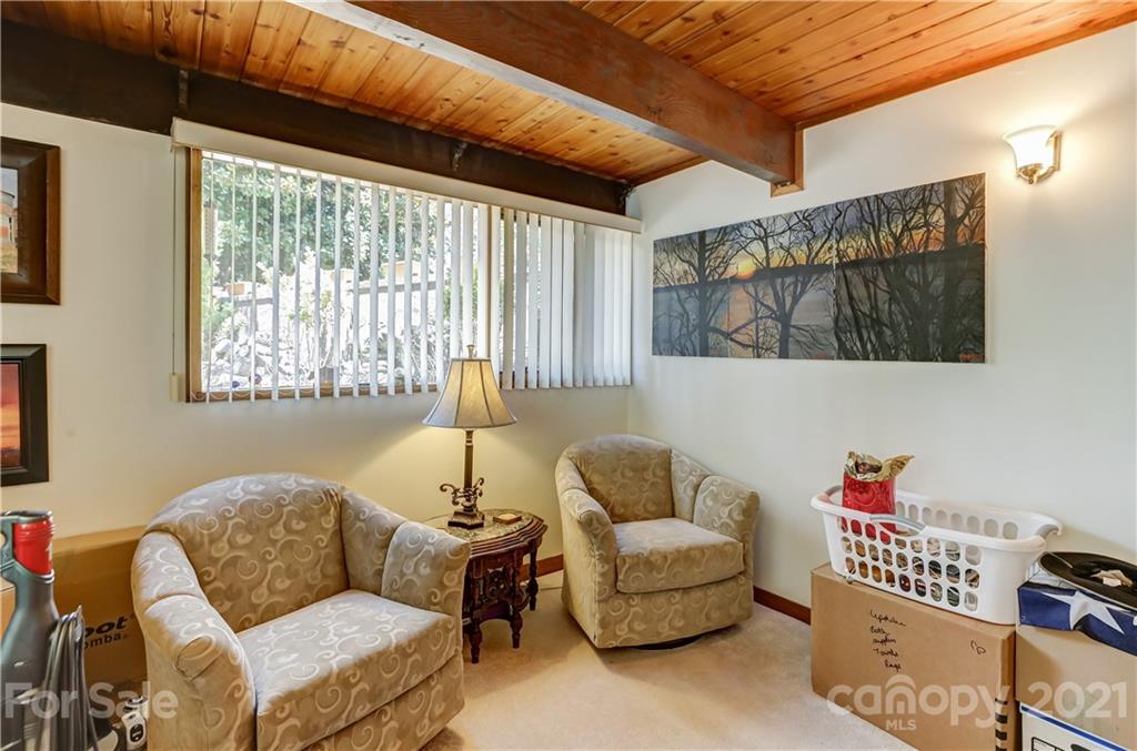 8017 Kiwi Point Tega Cay, SC 29708 - Photo 23 of 43 a living room with furniture and a window