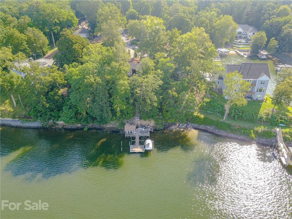 8017 Kiwi Point Tega Cay, SC 29708 - Photo 40 of 43 a view of a lake from a yard