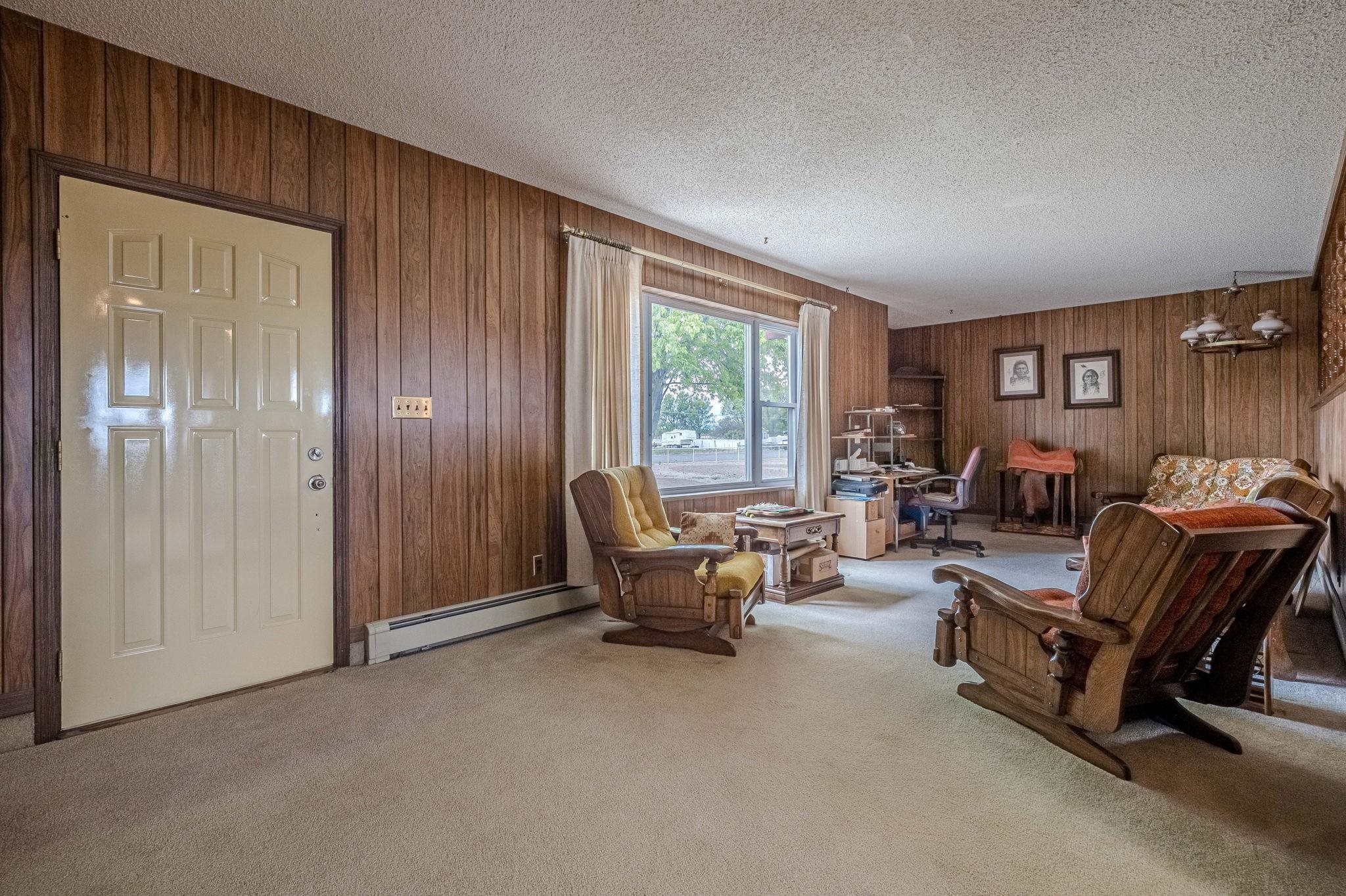 1176-17 17 1/2 Road Fruita, CO 81521 - Photo 15 of 42 a living room with furniture and a window