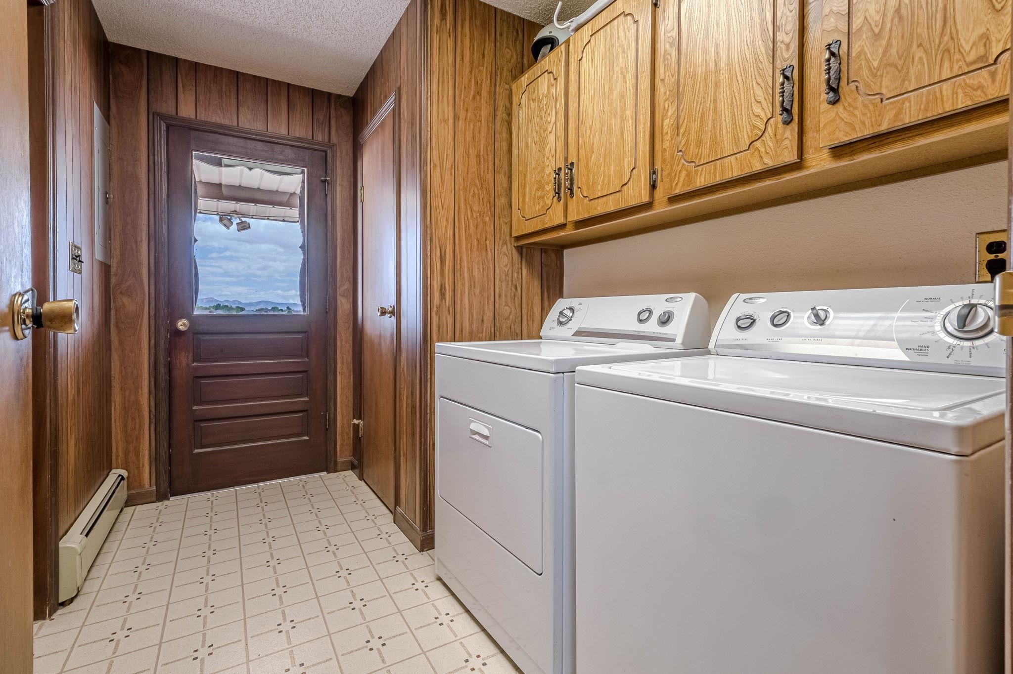 1176-17 17 1/2 Road Fruita, CO 81521 - Photo 17 of 42 a utility room with dryer and washer