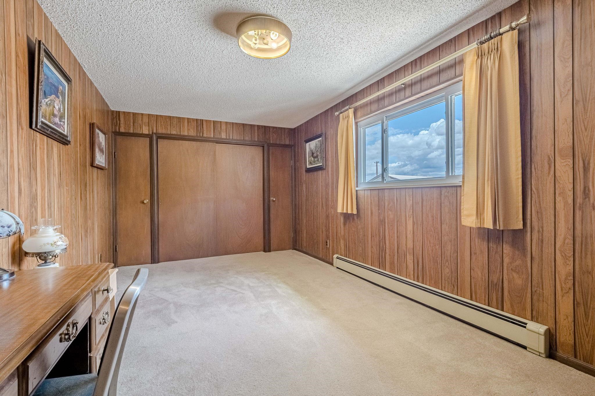 1176-17 17 1/2 Road Fruita, CO 81521 - Photo 20 of 42 a view of an empty room with a window