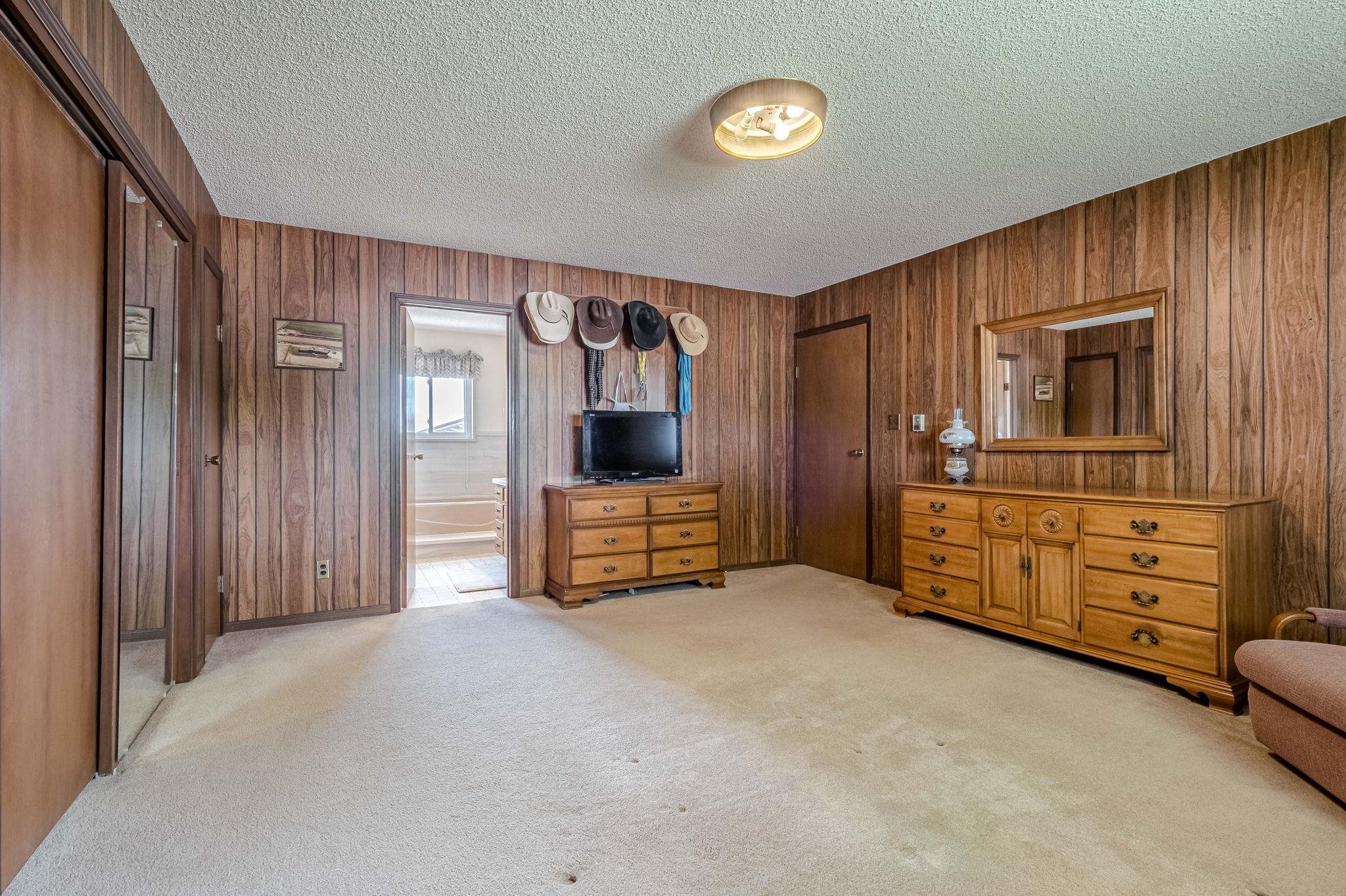 1176-17 17 1/2 Road Fruita, CO 81521 - Photo 23 of 42 a room with furniture and a flat screen tv