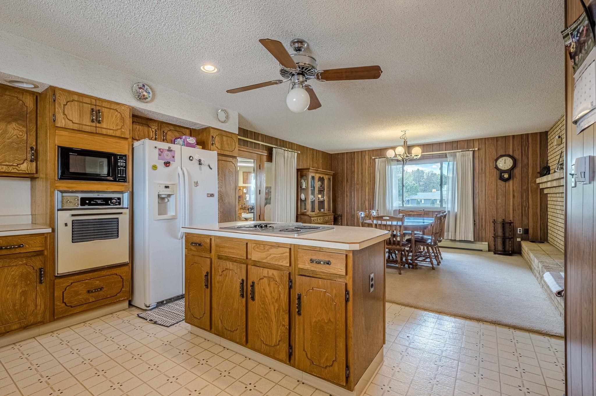 1176-17 17 1/2 Road Fruita, CO 81521 - Photo 28 of 42 a kitchen with stainless steel appliances a stove a refrigerator and a sink