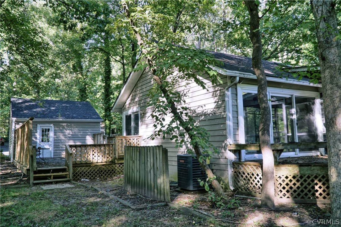 3110 3 Bridges Road Midlothian, VA 23112 - Photo 3 of 16 garage and back of home