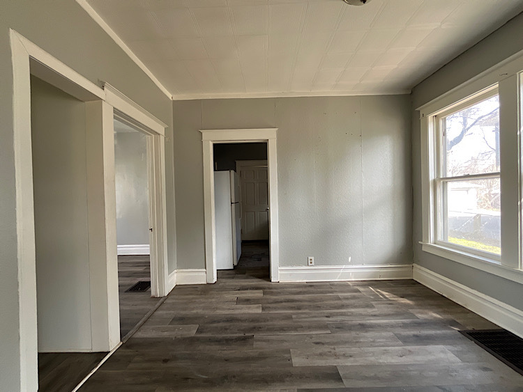 519 North View Street Aurora, IL 60506 - Photo 4 of 15 a view of an empty room with wooden floor and a window