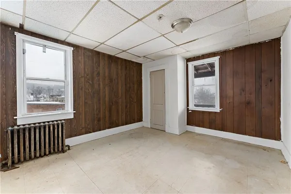 an empty room with windows