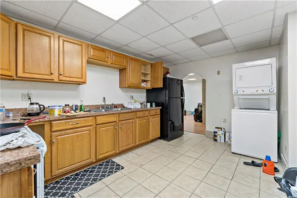 a bathroom with a toilet sink and vanity